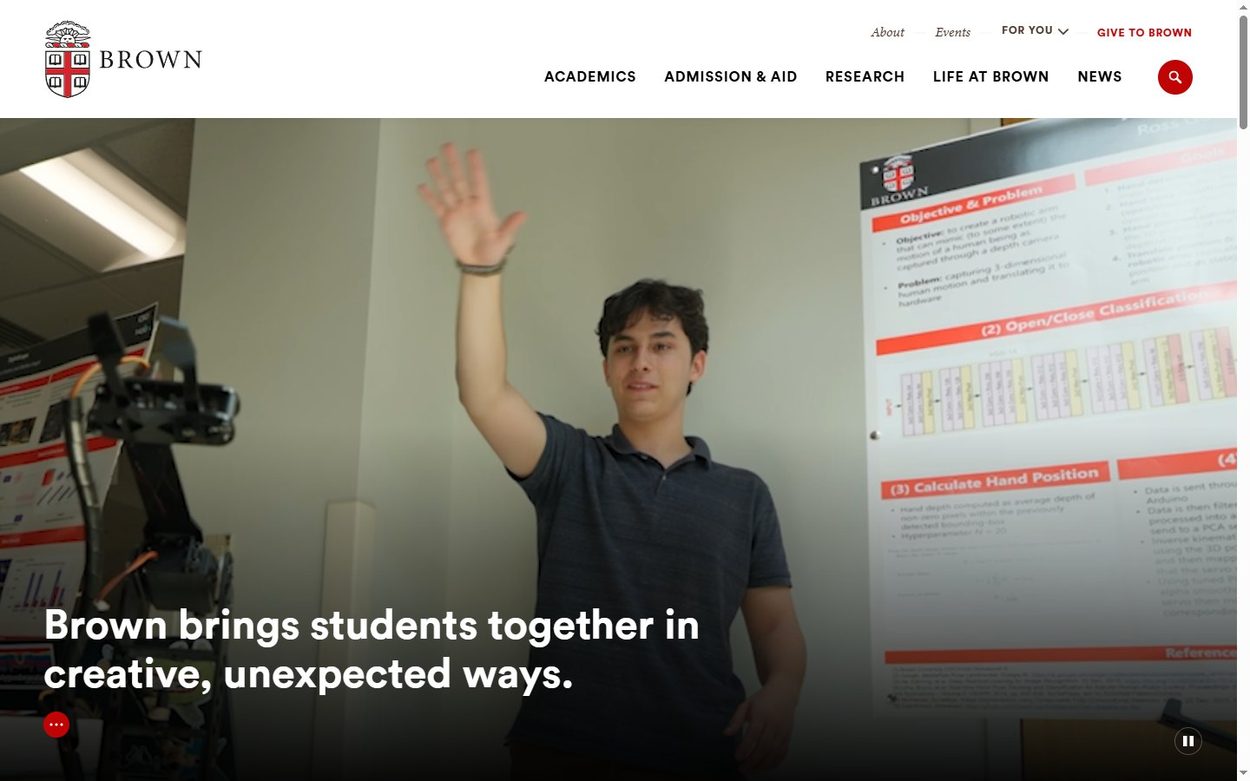 Brown University home page with a full width student photo and a short white headline