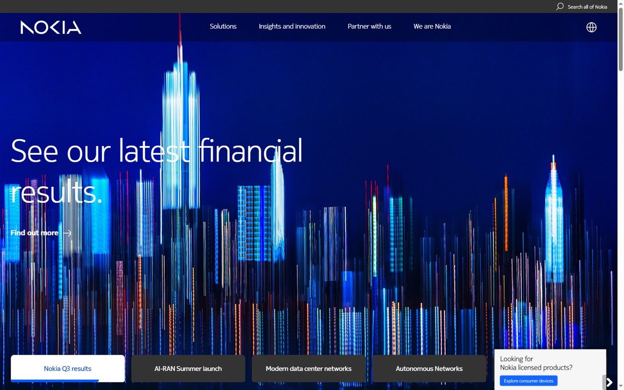 Nokia home page with a blue digital city skyline and shortcut cards along the bottom