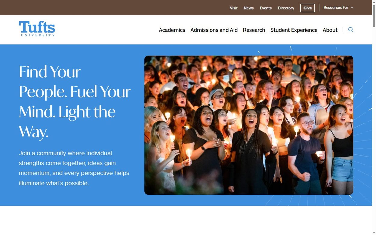 Tufts University home page with a blue panel, serif headline and candlelit crowd photo