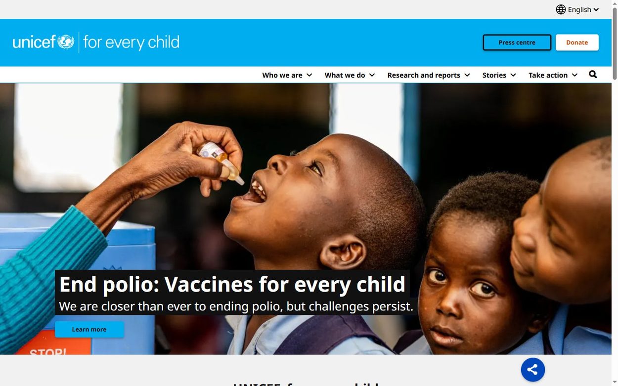 UNICEF home page with a child receiving a polio vaccine and the signature cyan header